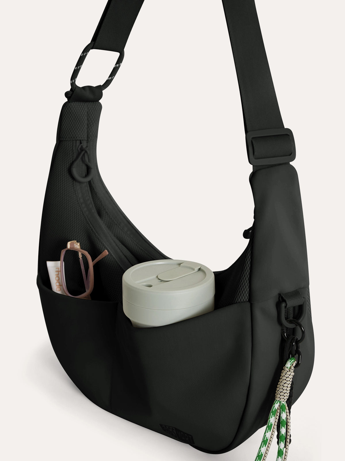 BAGSMART Reiki REIKI 中號弧形斜背包側邊防水口袋展示圖
