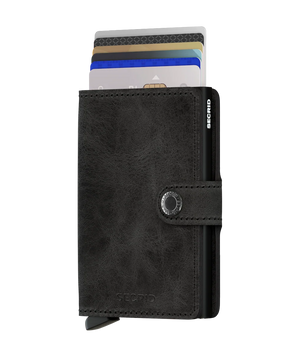 荷蘭製造 SECRID 最暢銷 Miniwallet 真皮防盜銀包 (Matte Satin Steel)。掌心大小蘊藏極大容量，結合榮獲紅點設計大獎的鋁合金卡槽與歐洲優質牛皮，一鍵順滑彈出卡片，為您提供全面的 RFID 防盜刷保護。