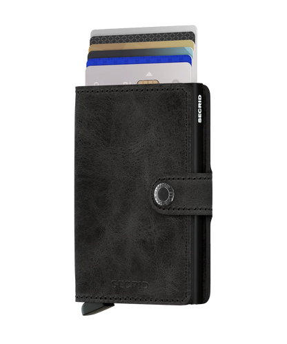 荷蘭製造 SECRID 最暢銷 Miniwallet 真皮防盜銀包 (Matte Satin Steel)。掌心大小蘊藏極大容量，結合榮獲紅點設計大獎的鋁合金卡槽與歐洲優質牛皮，一鍵順滑彈出卡片，為您提供全面的 RFID 防盜刷保護。